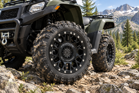 454 Black Frontline All-Terrain wheels installed on an ATV