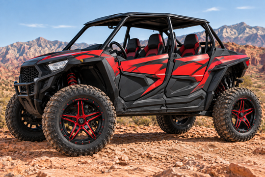 
                  
                    Driver's-side view of a Side-by-Side UTV with 505 red-and-black Frontline wheels
                  
                